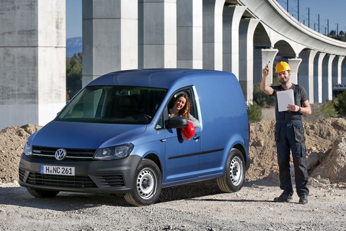 VW Caddy 3 - standard SWB van, metallic blue, front view, constructionsite