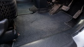 Car mats in a car footwell