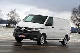 Volkswagen ABT eTransporter electric van - front view, driving, white, snow, 2020