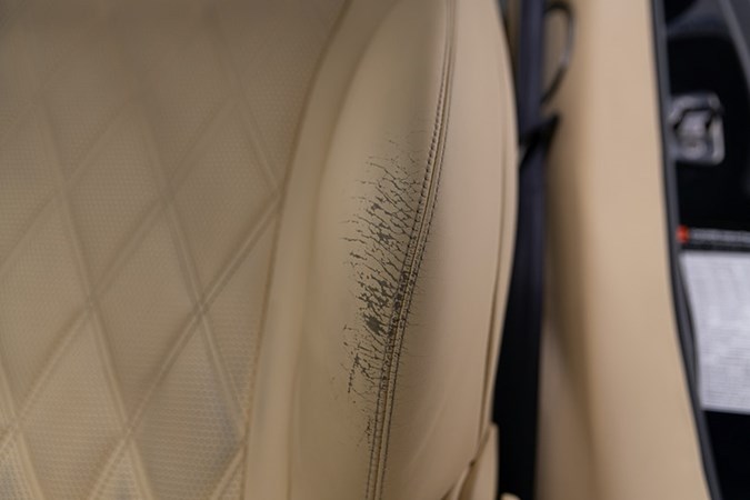 Damaged leather car seat