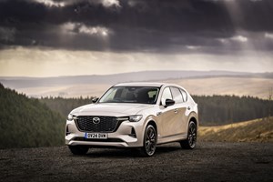 Image of white Mazda CX-60, static, from the front left corner