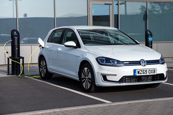 VW electric cars - e-Golf, charging, white, front view
