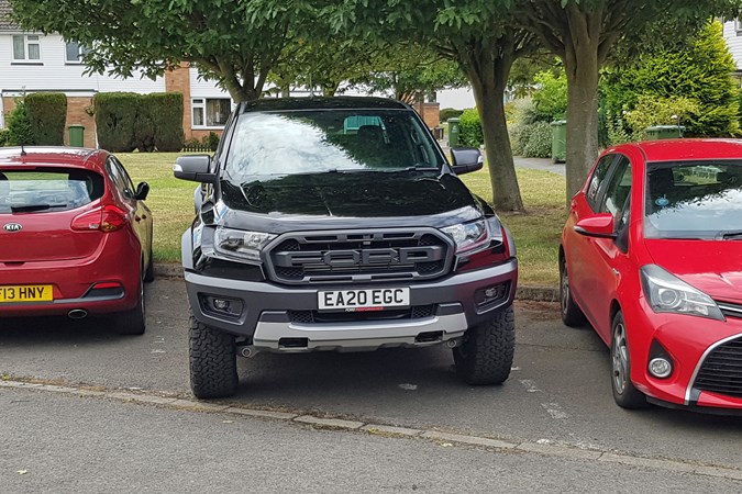 Ford Ranger Raptor long-term test review 2020 - front view, parking space with tiny cars