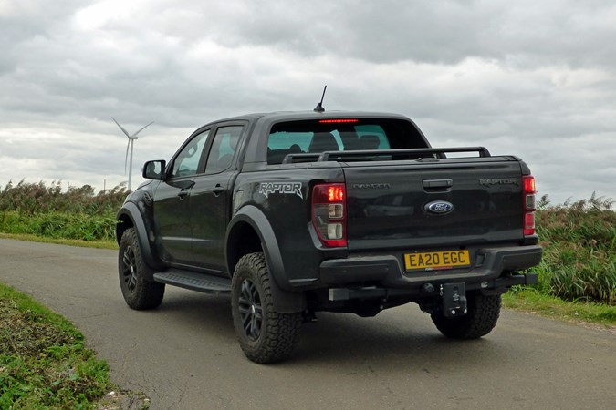 Ford Ranger Raptor long-term test review 2020 - rear view, black, country road, wind turbine