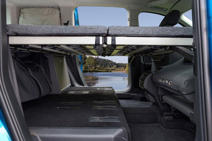 Volkswagen Caddy California campervan, 2020, bed, viewed from the side
