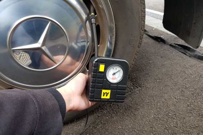 AA Tyre Inflator Compressor connected to wheel