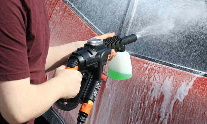 Pressure washing a car