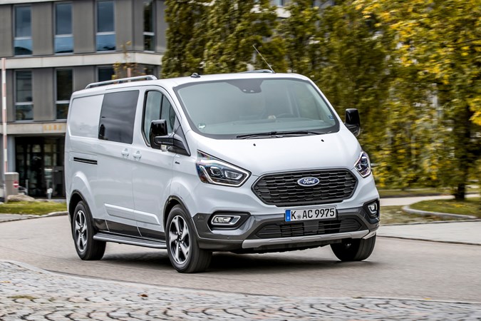 Ford Transit Custom Active review, 2020, DCiV, white, front view, driving round corner