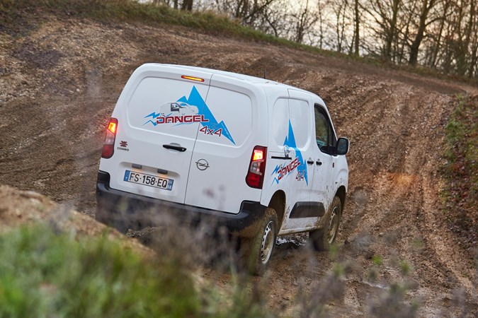 Vauxhall Combo Cargo 4x4 review - white, rear view, muddy track