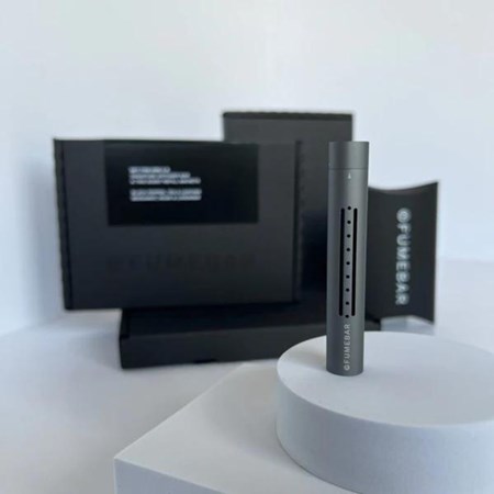 The FUMEBAR capsule with packaging in the background.