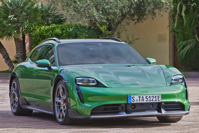 Green Porsche Taycan Cross Turismo front three-quarter