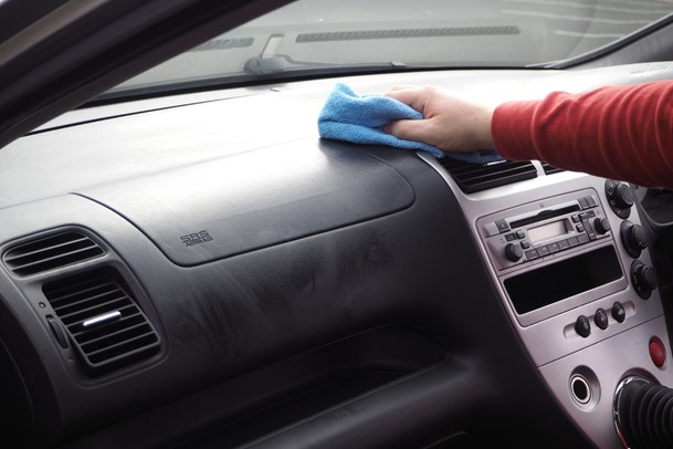 Cleaning the dashboard of a car