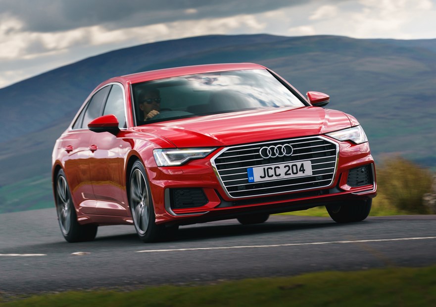 Audi A6 Saloon (2018-) UK rhd model in red, front three-quarters driving