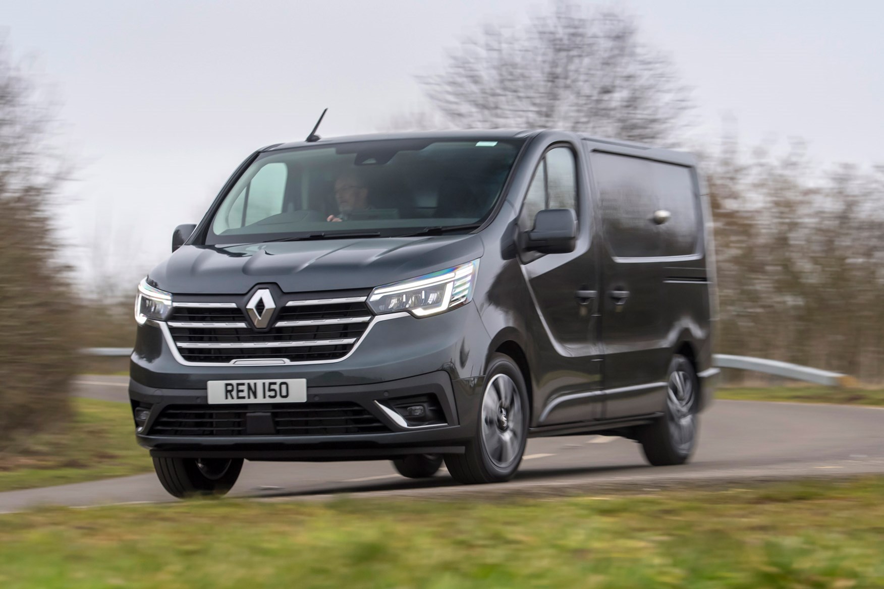 Renault Trafic van review - 2022 facelift model, front, driving round corner