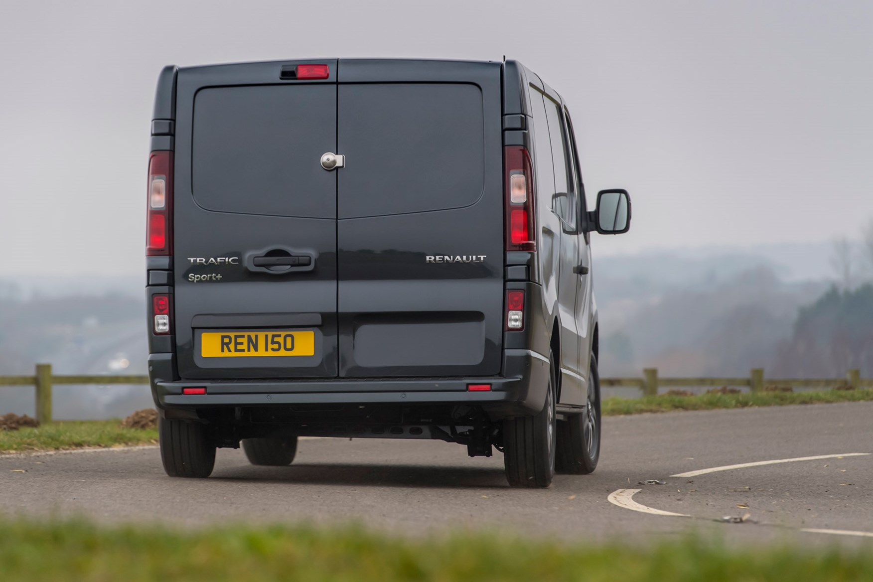 Renault Trafic van review - 2022 facelift model, rear, driving round corner