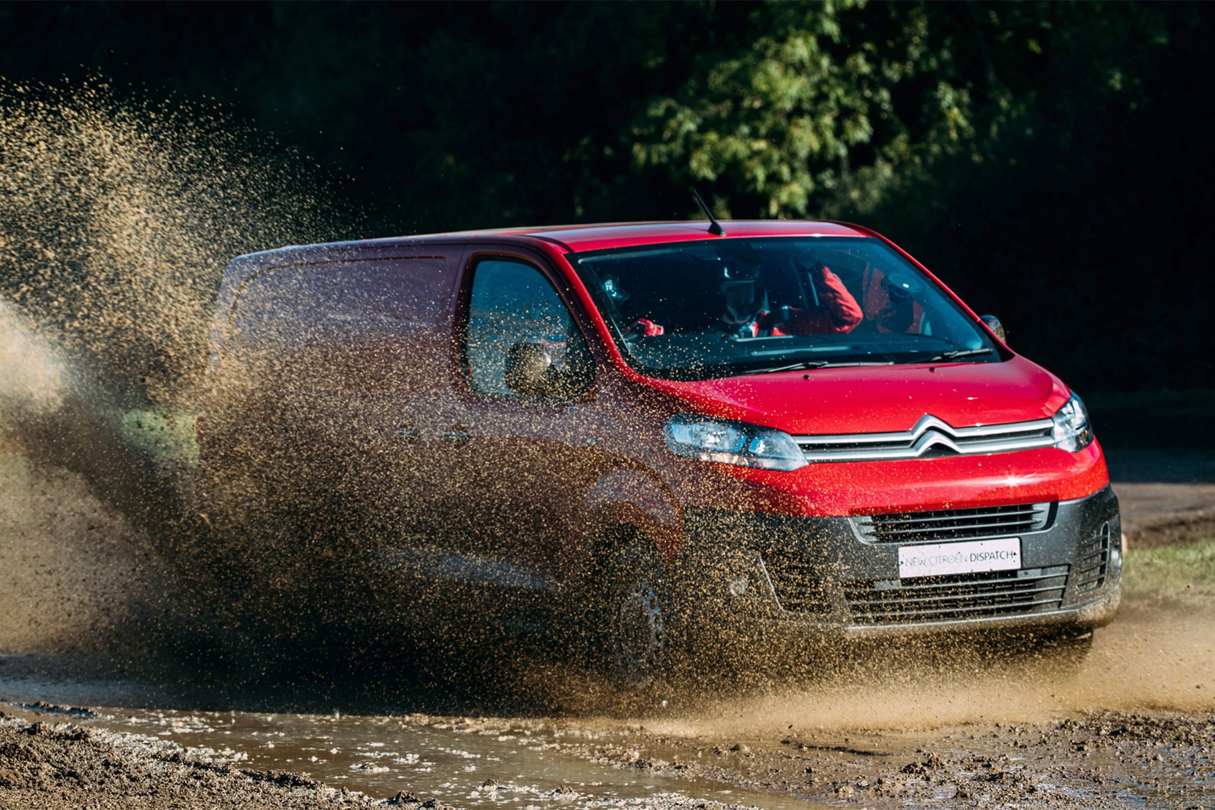 Citroen Dispatch review - front view, red, splashing through mud