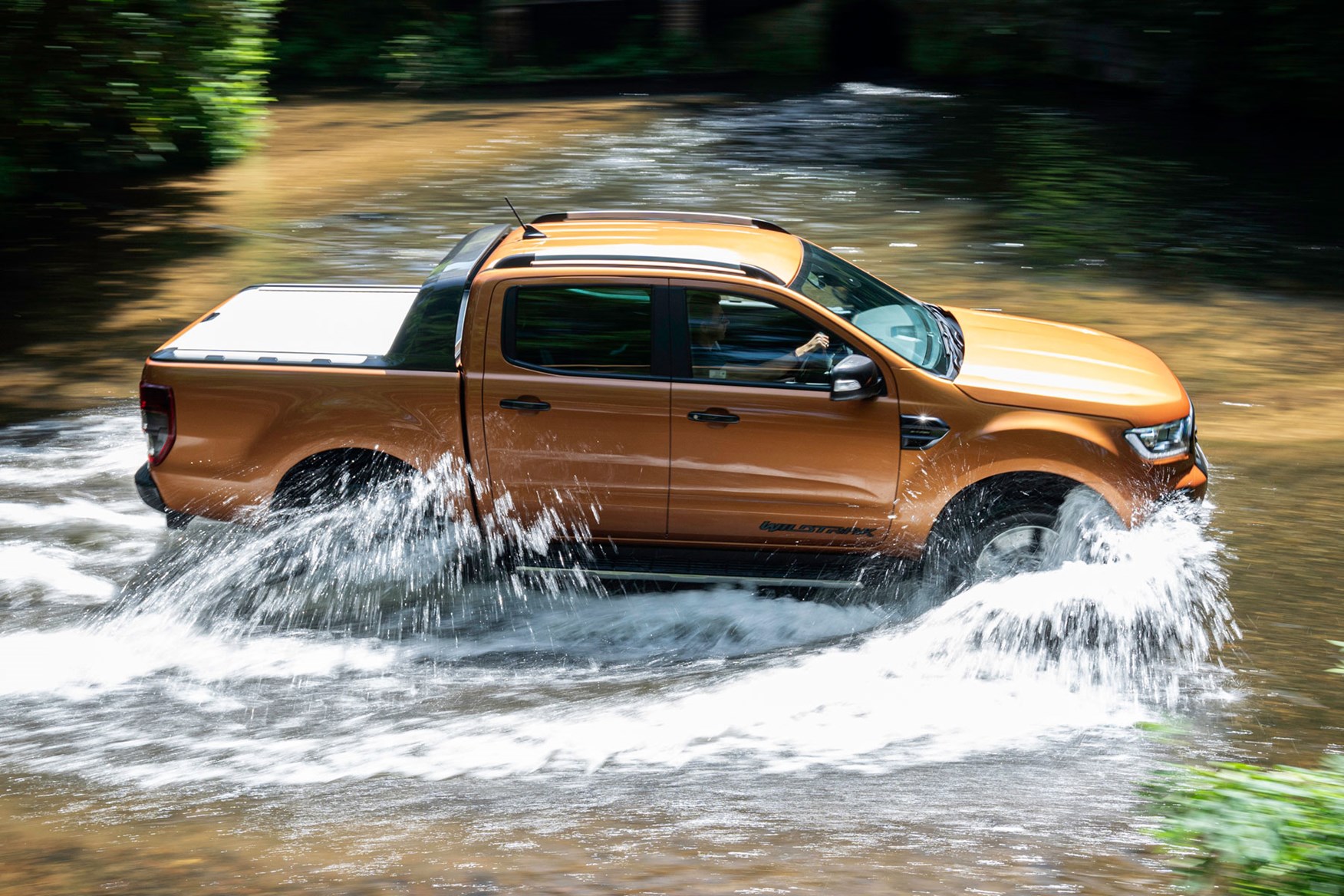 Ford Ranger review - 2019 facelift, side view, wading through water, Wildtrak, orange