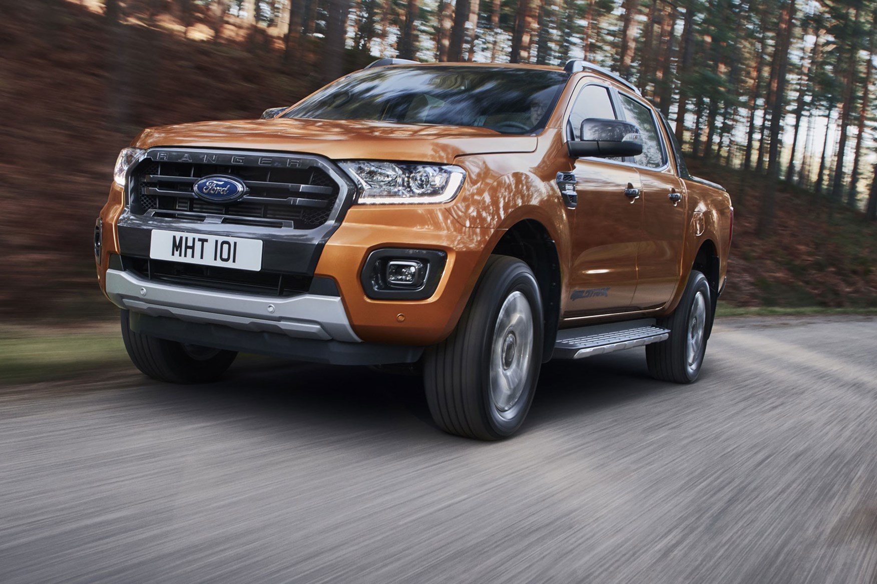 Ford Ranger review - 2019 facelift, front view, driving, Wildtrak, orange