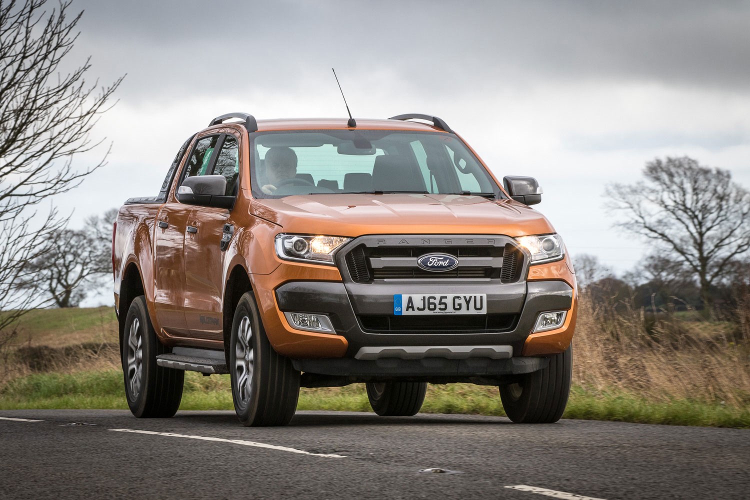 Ford Ranger review - 2016 facelift, front view, driving, orange, Wildtrak