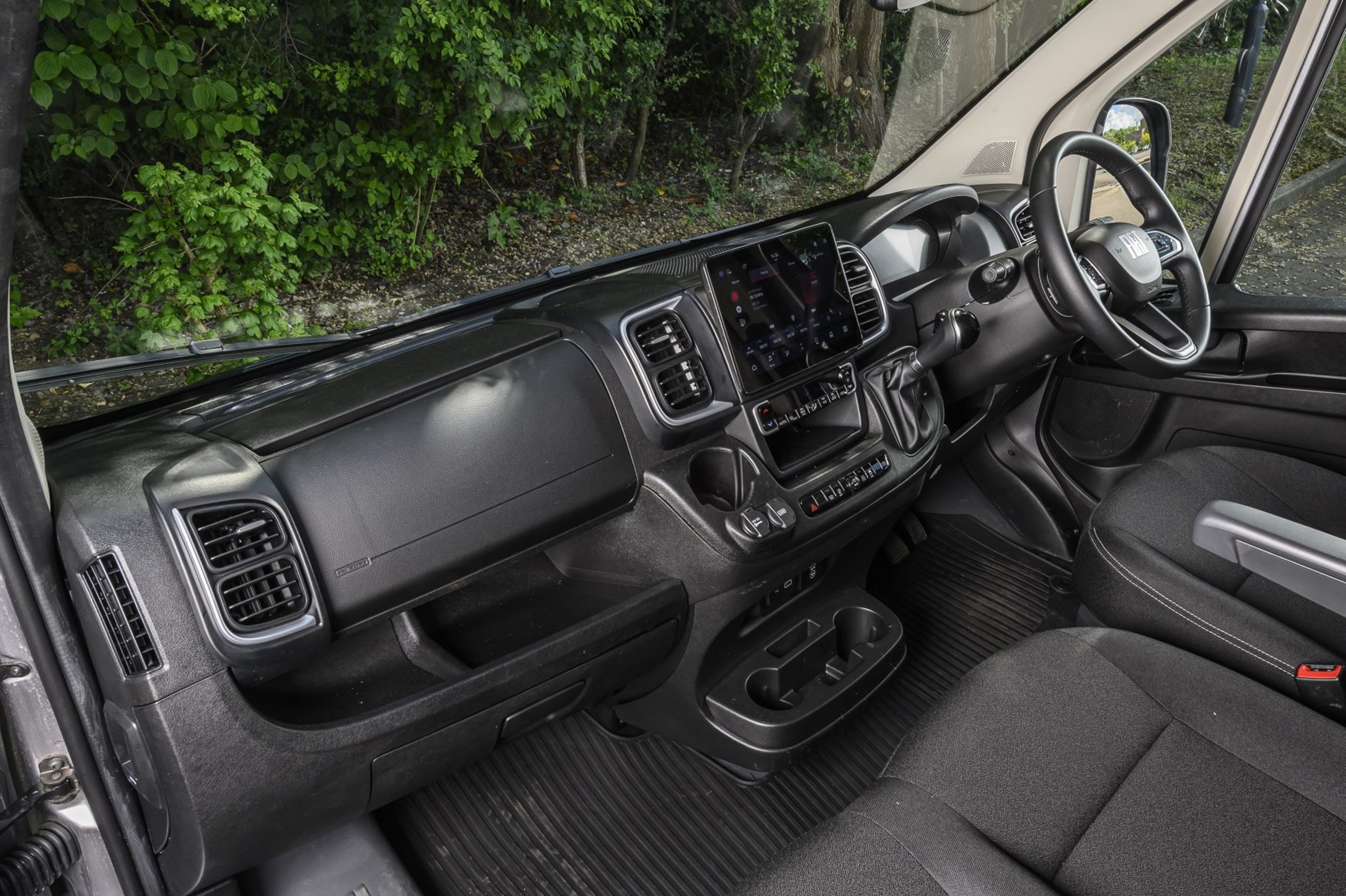 Image of the 2025 Fiat Ducato cabin, seen from the open passenger door