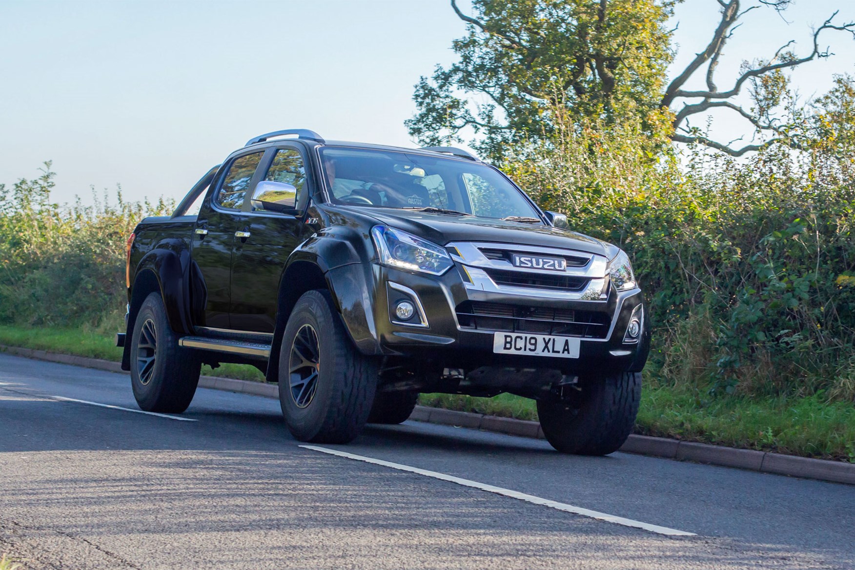 Isuzu D-Max Arctic Trucks AT35, 2019, front view, driving on road