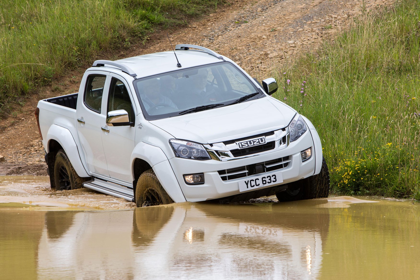 Isuzu D-Max AT35 2.5 review - front view, driving into water, white