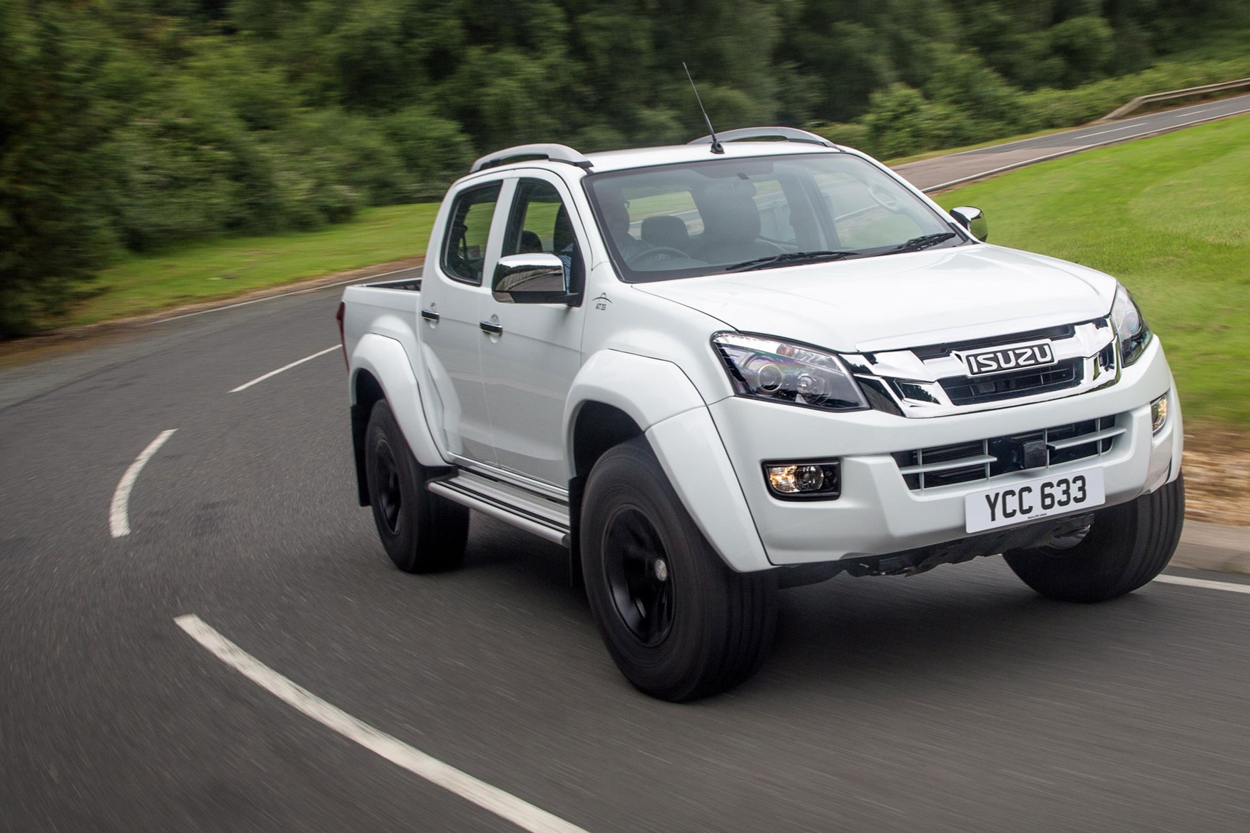 Isuzu D-Max AT35 2.5 review - front view, driving on road, white