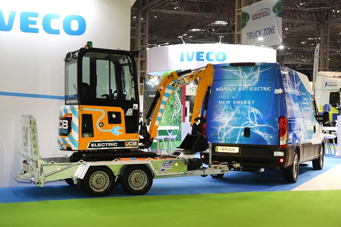 Iveco eDaily, rear three quarter, towing an electric JCB mini digger