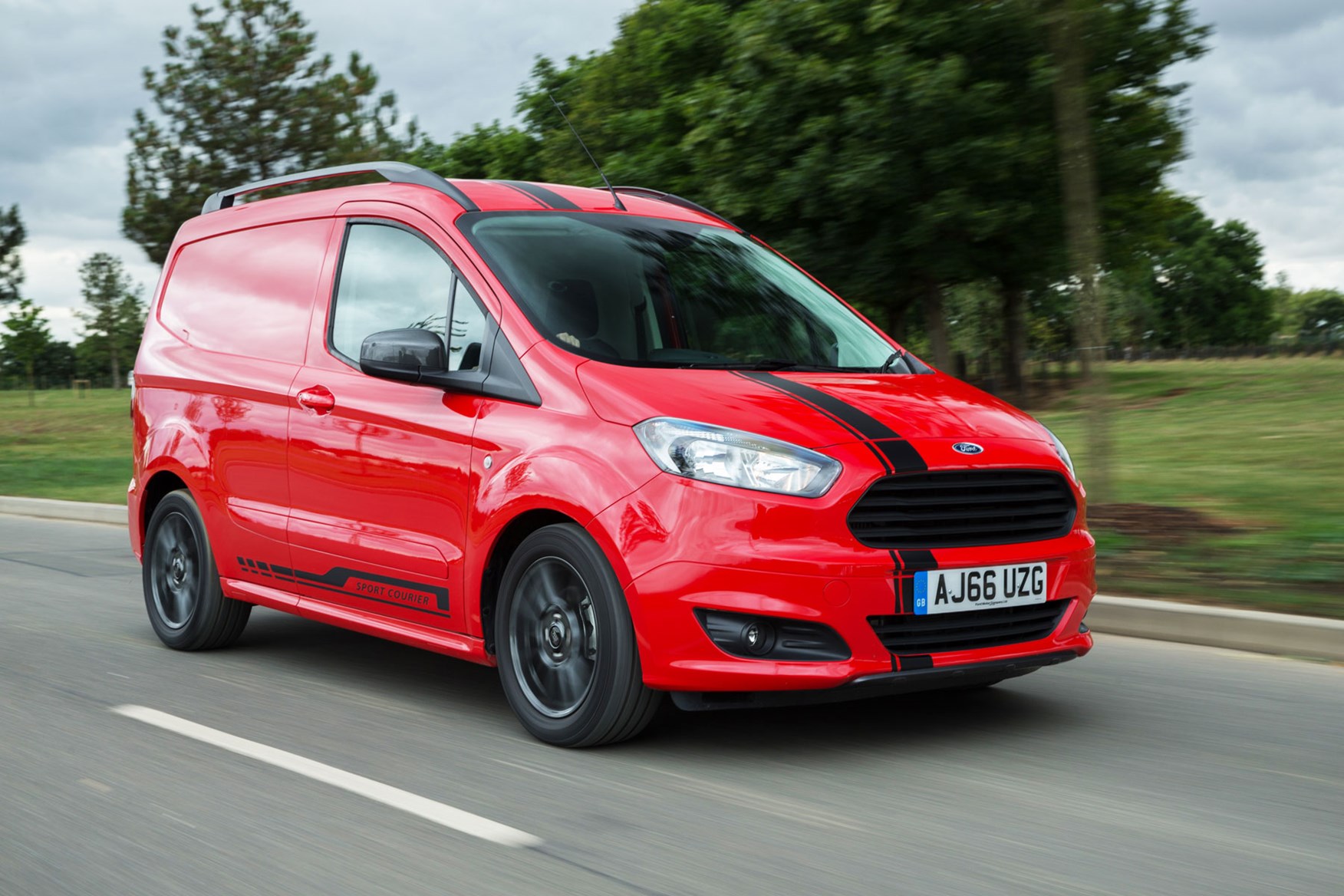 Ford Transit Courier Sport, 2017 model, front view, red, driving