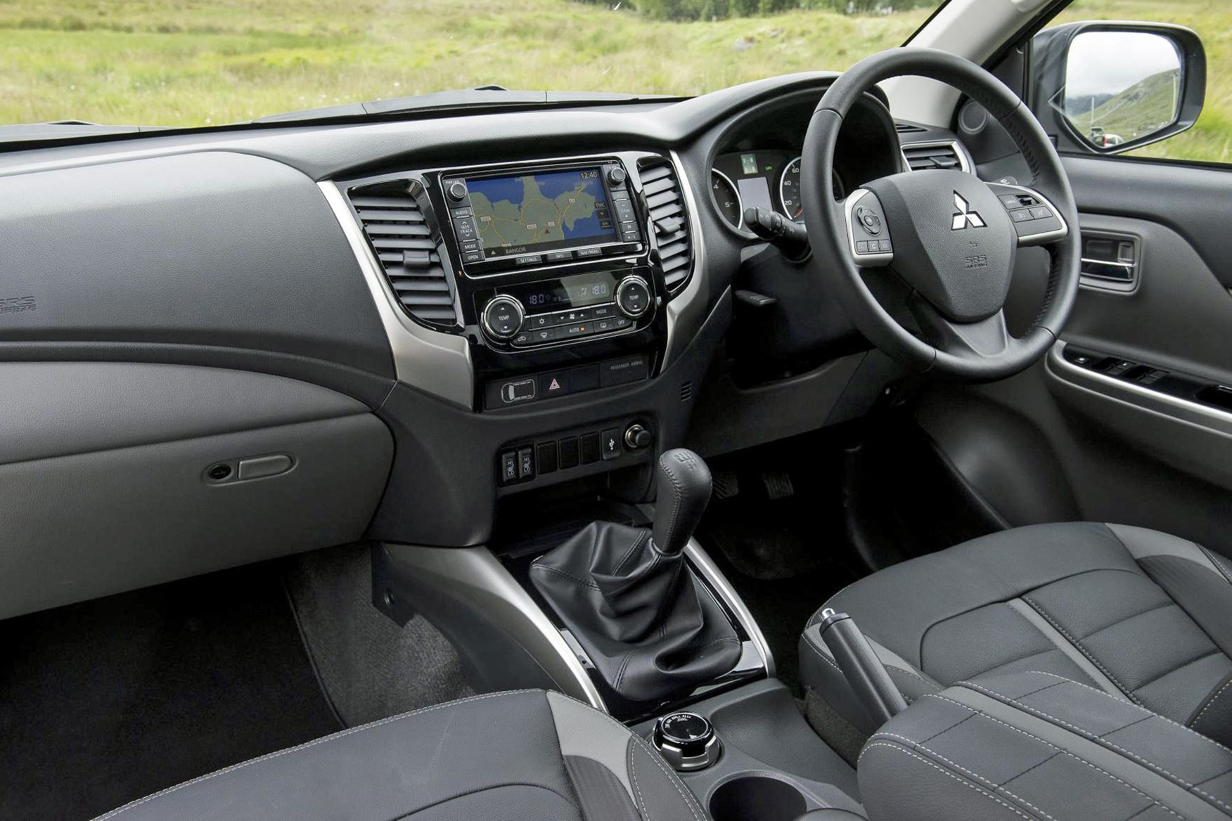 Mitsubishi L200, cab interior, lifestyle with touchscreen