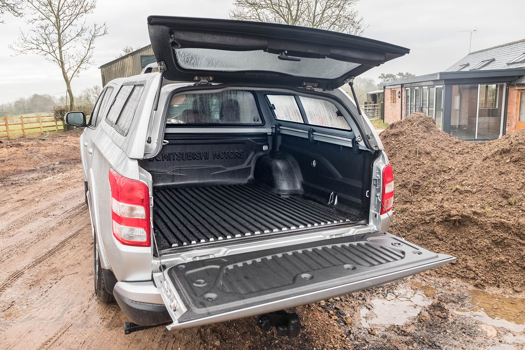 Mistubishi L200 Warrior 2018 review - rear view with Truckman top, silver, tailgates open