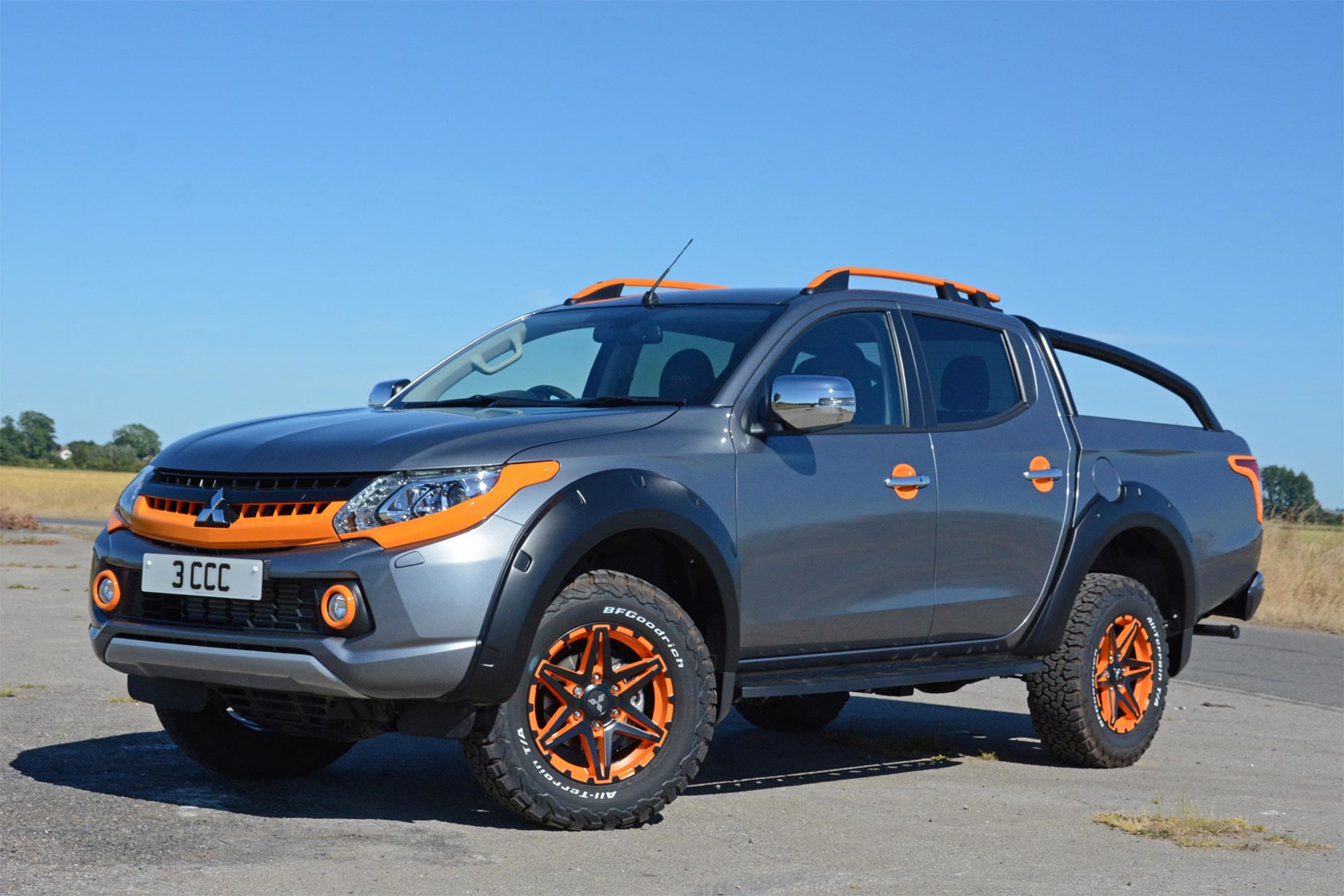 Mitsubishi L200 Barbarian SVP II review - front view, grey and orange