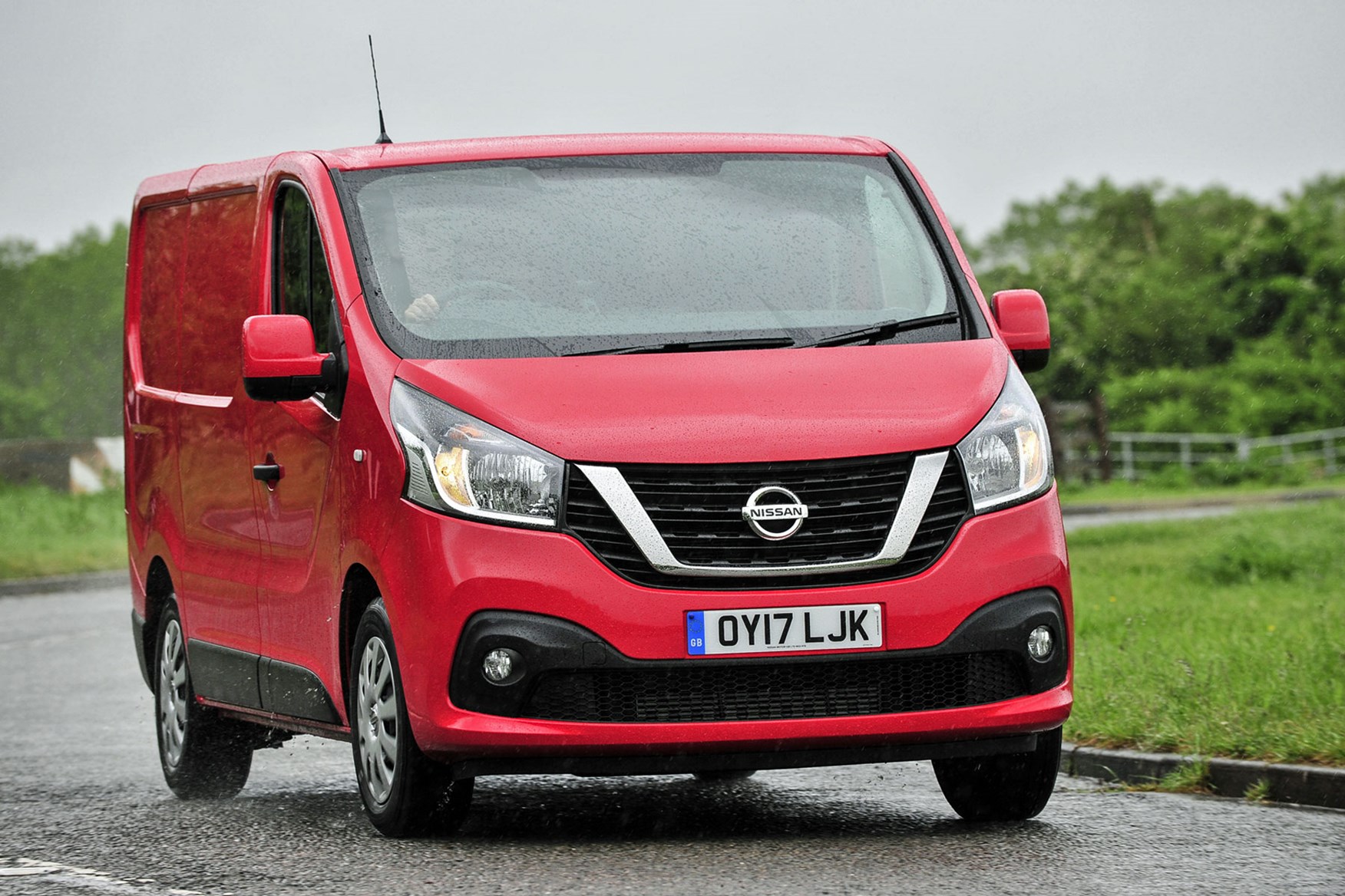 Nissan NV300 - red, front view, UK, driving in the rain, 2017