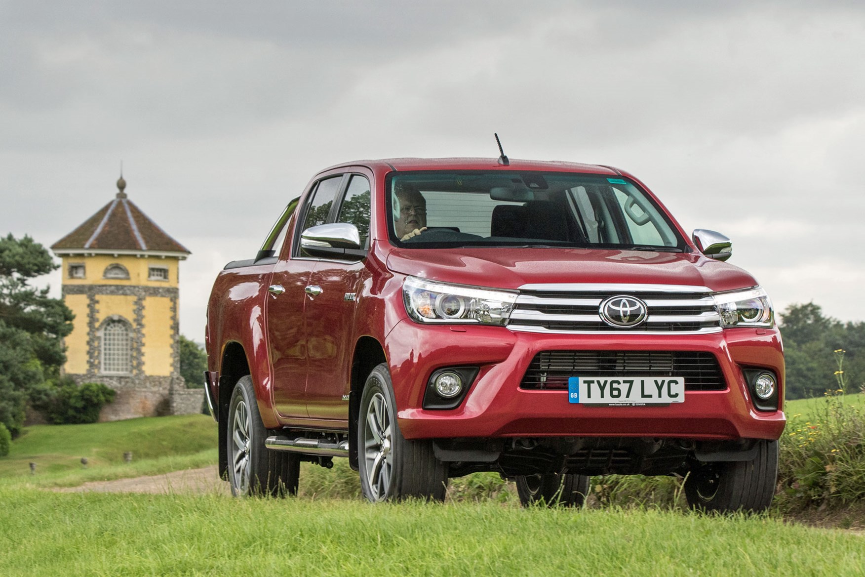 Toyota Hilux review - front view, driving, red, Invincible