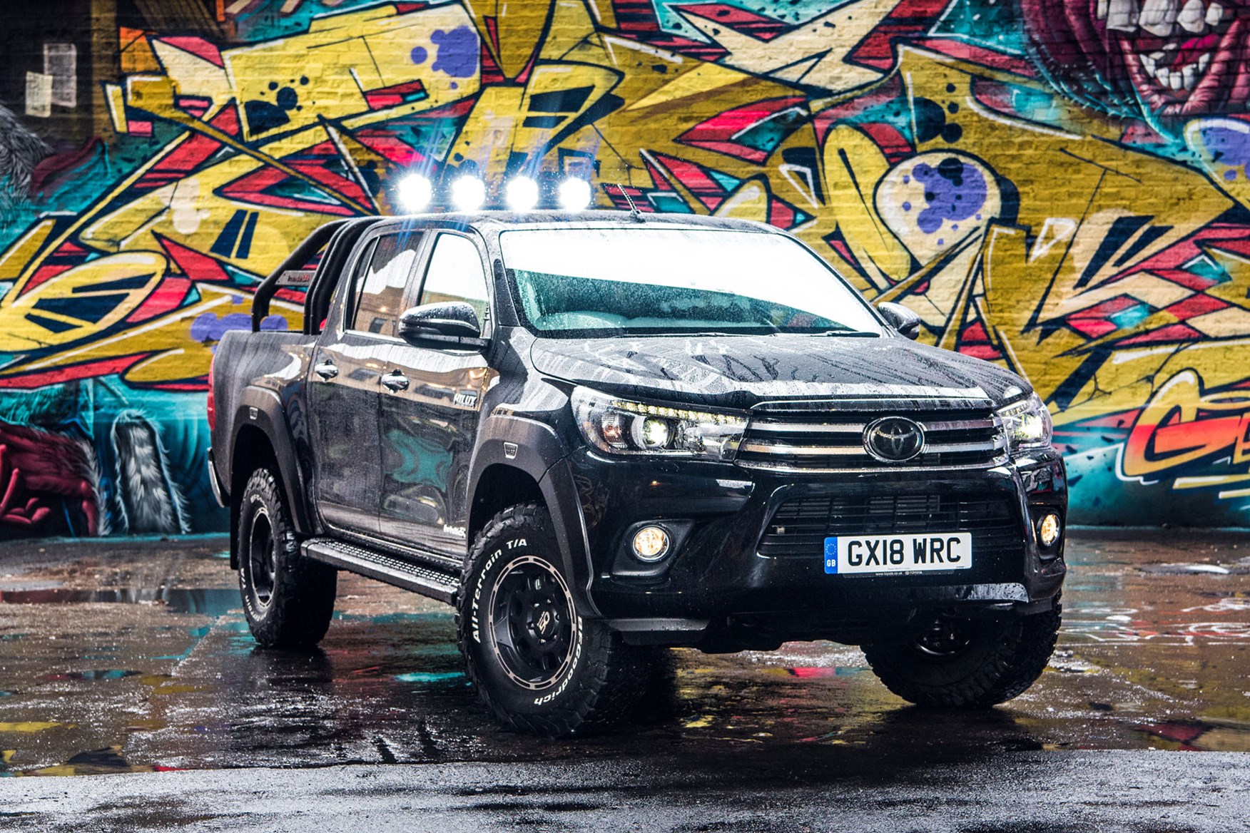 Toyota Hilux review - Invincible 50 special edition, black, front view, spotlights on