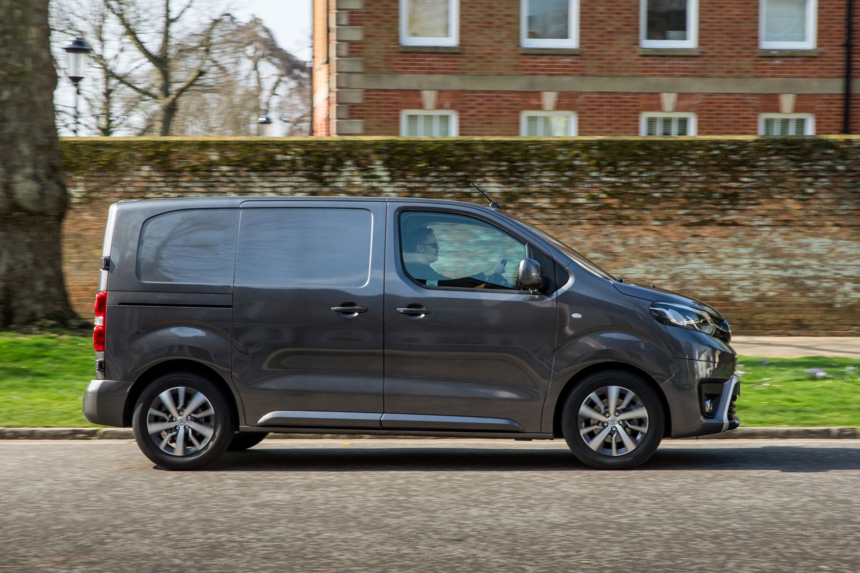 Toyota Proace review - Compact model, side view, driving, grey, 2018