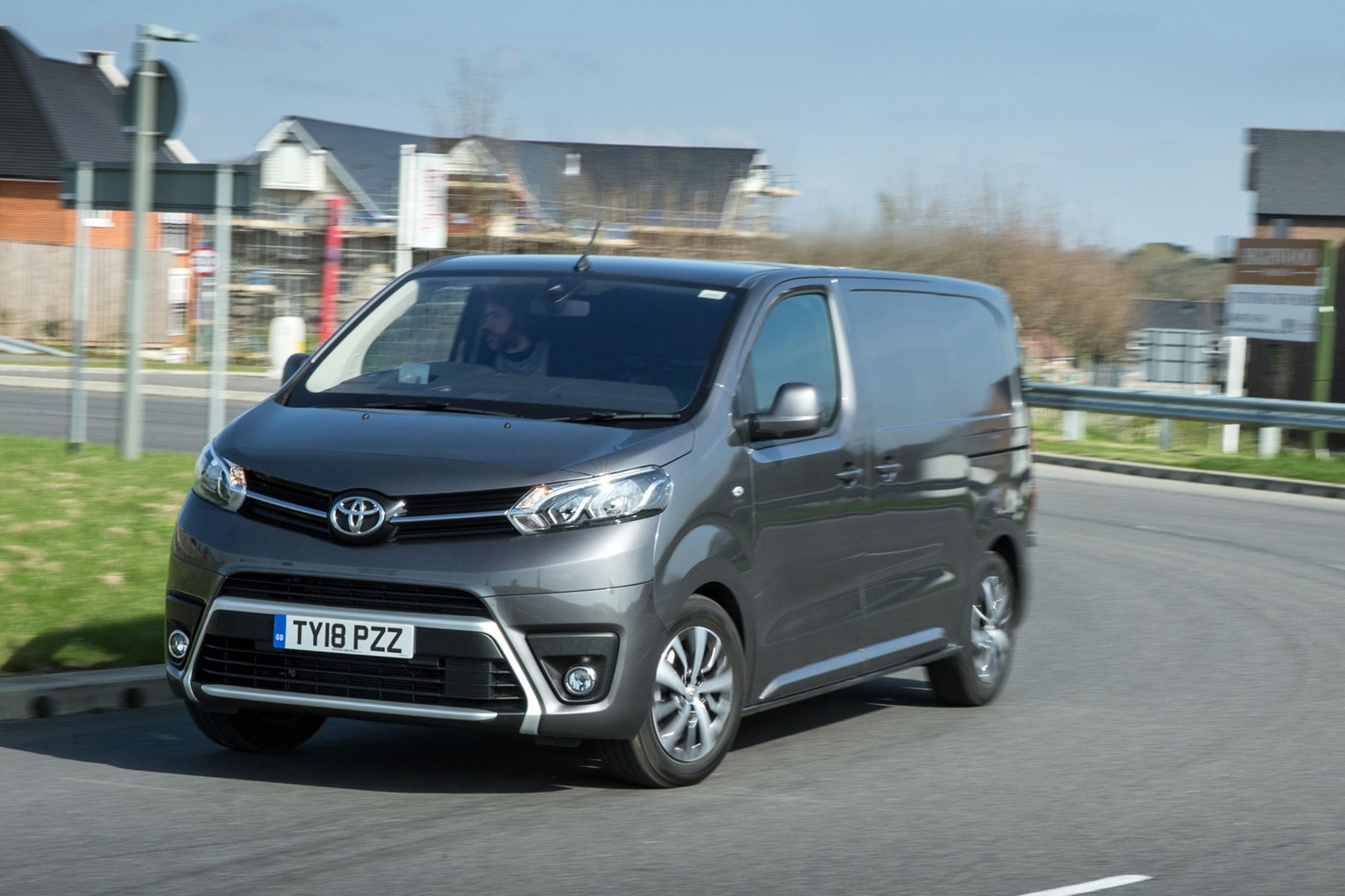 Toyota Proace review - Medium model, front view, driving round corner, grey, 2018