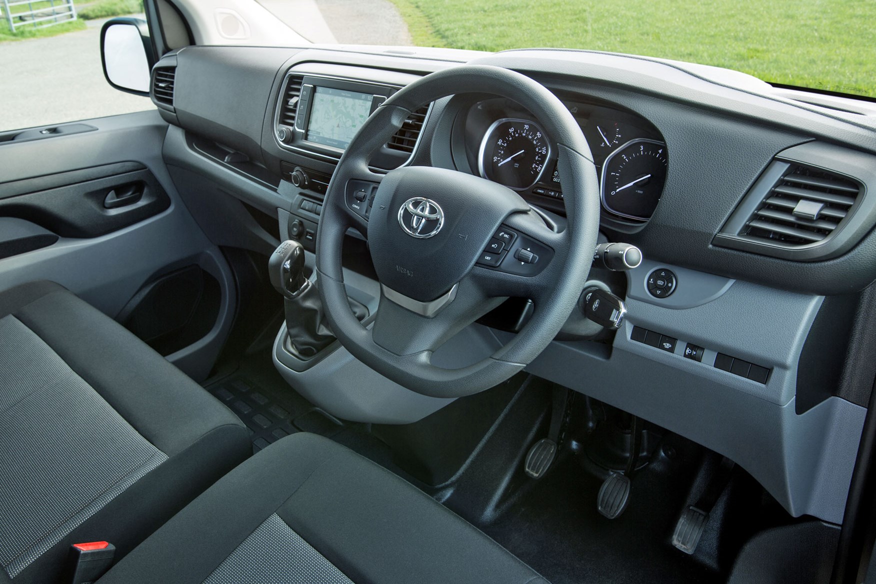 Toyota Proace review - cab interior showing whole dashboard from driver's side, 2018