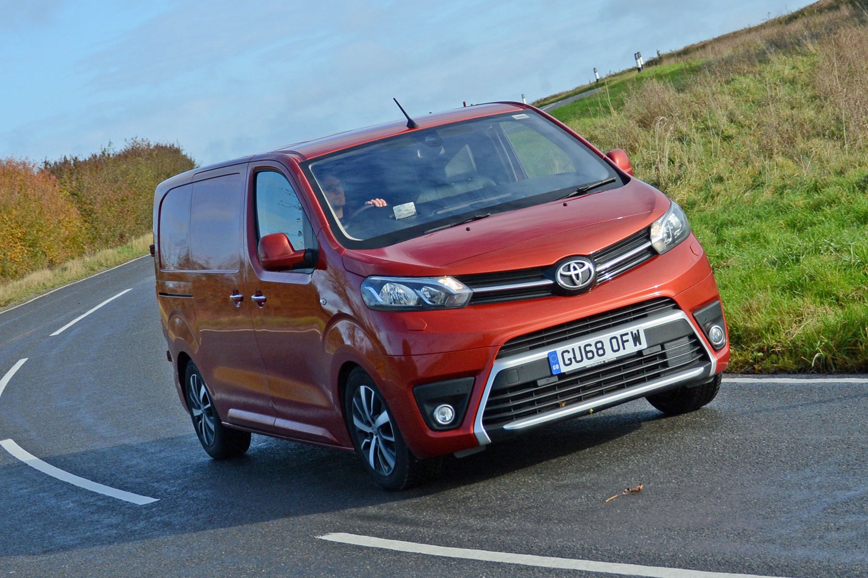 Toyota Proace automatic review - front view, driving round corner, orange, 2019