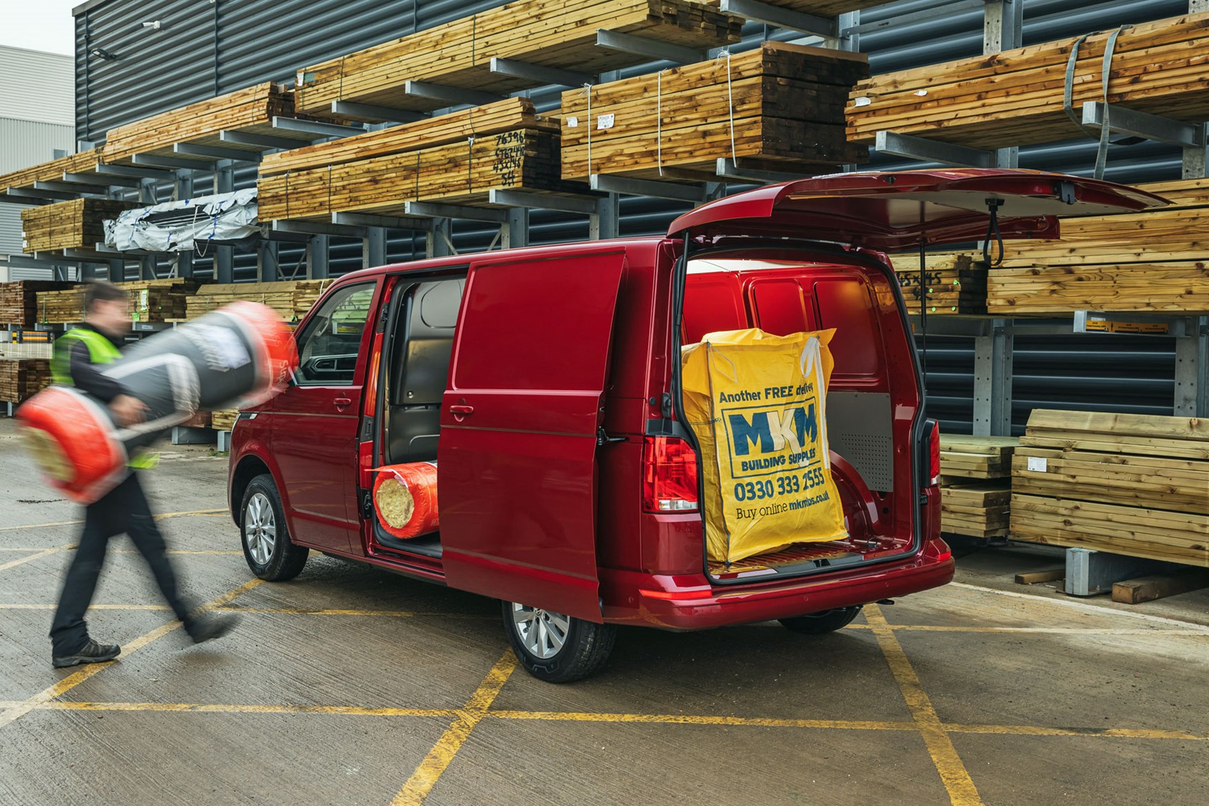 Volkswagen Transporter review, T6.1, 2020, red, rear view, van being loaded