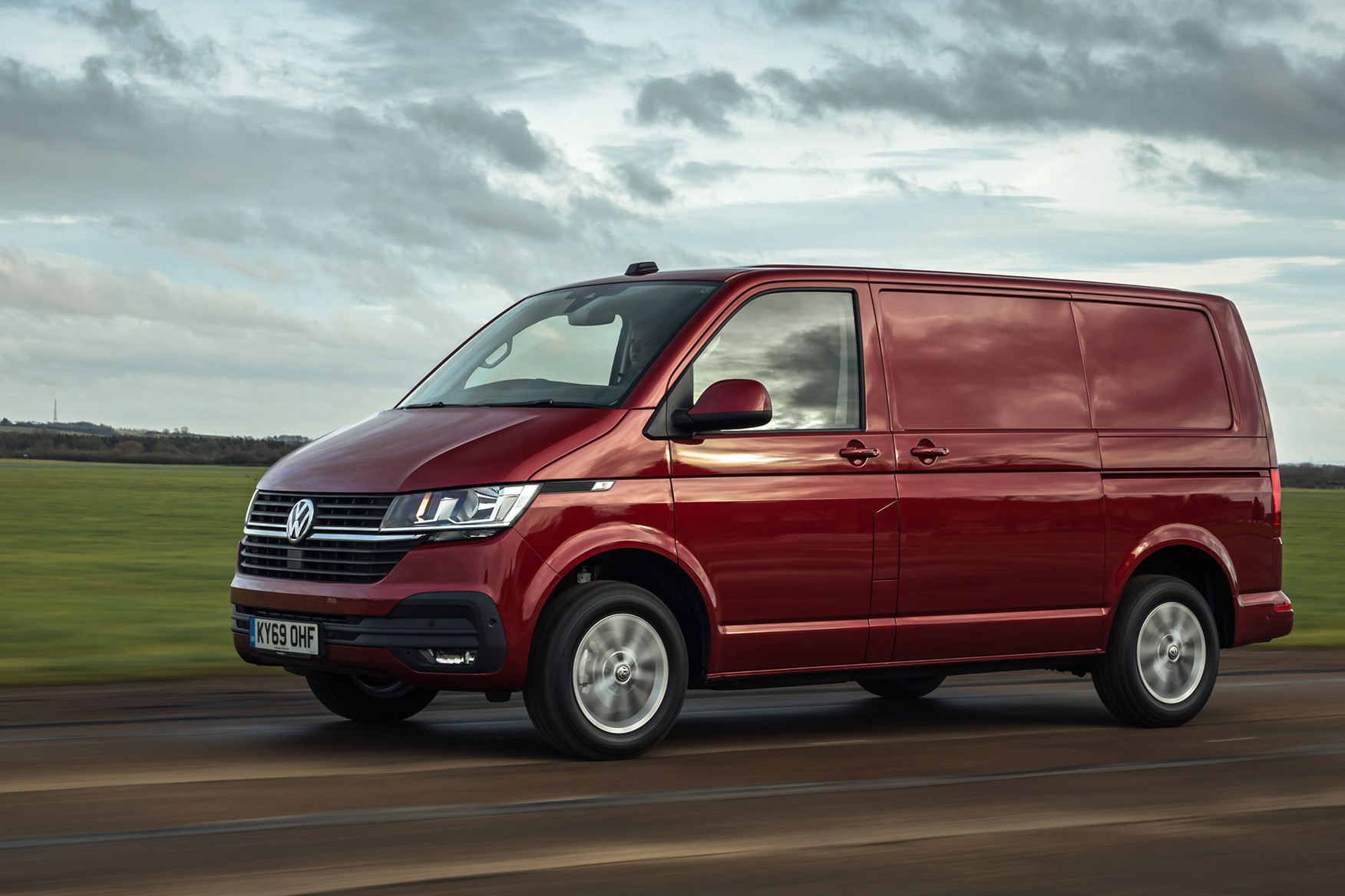 Volkswagen Transporter review, T6.1, 2020, red, side view, driving