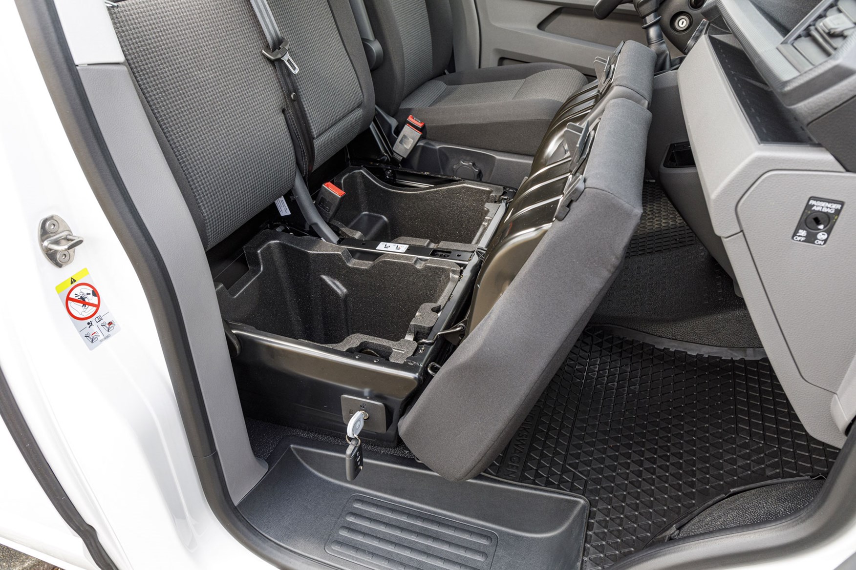 VW Transporter review - T6.1 2019 facelift, cab interior showing lockable under-seat storage