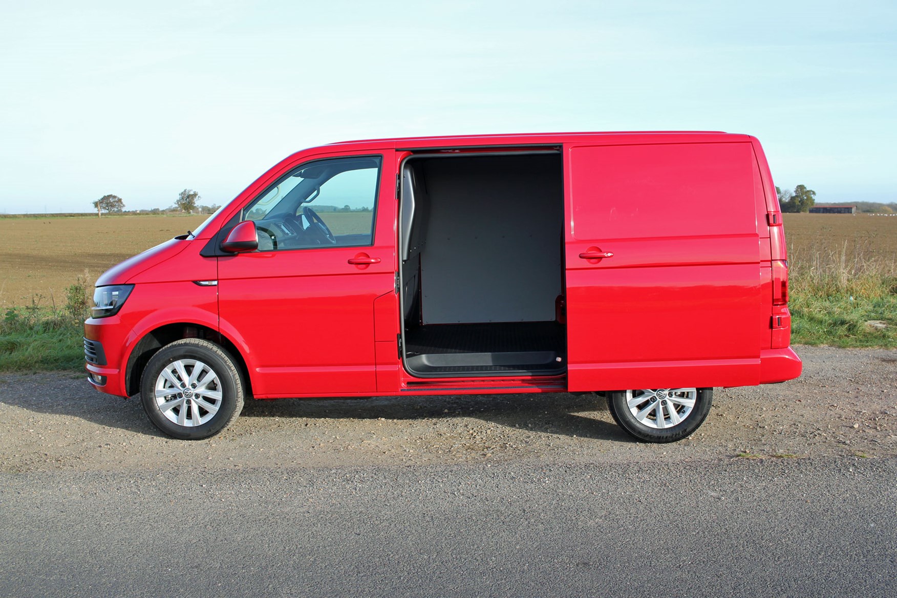 VW Transporter T6 TSI 150 review - side view, sliding door open, red