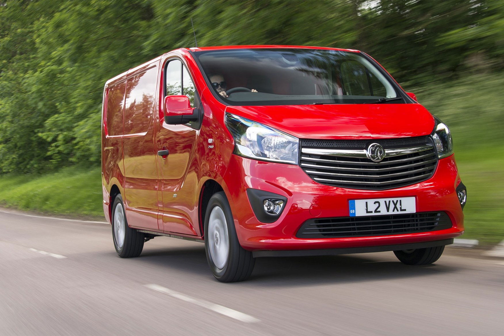 Vauxhall Vivaro review - front view, red, driving
