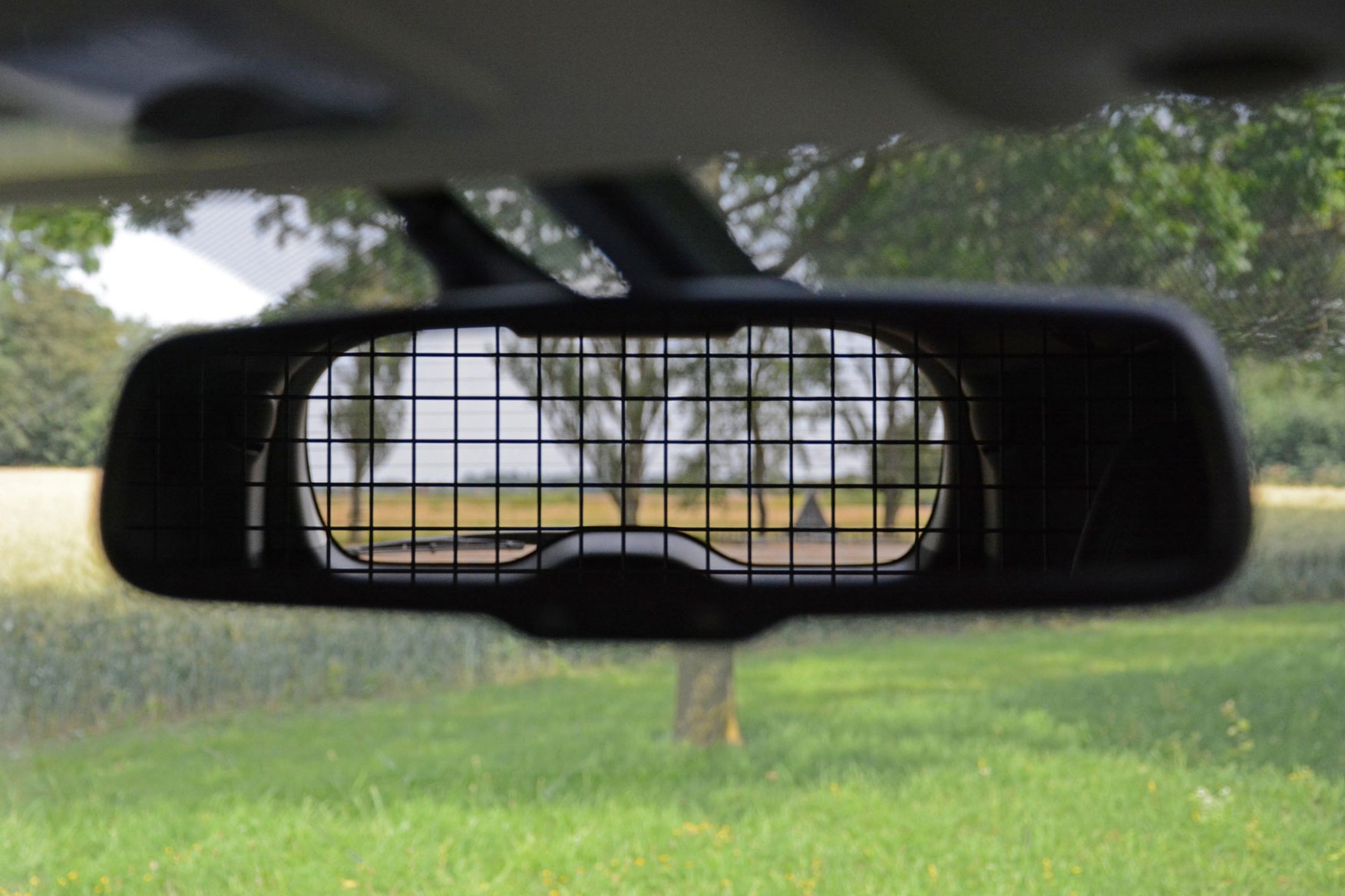 Mitsubishi Shogun Sport Commercial 4x4 van review - rear view in mirror through bulkhead mesh