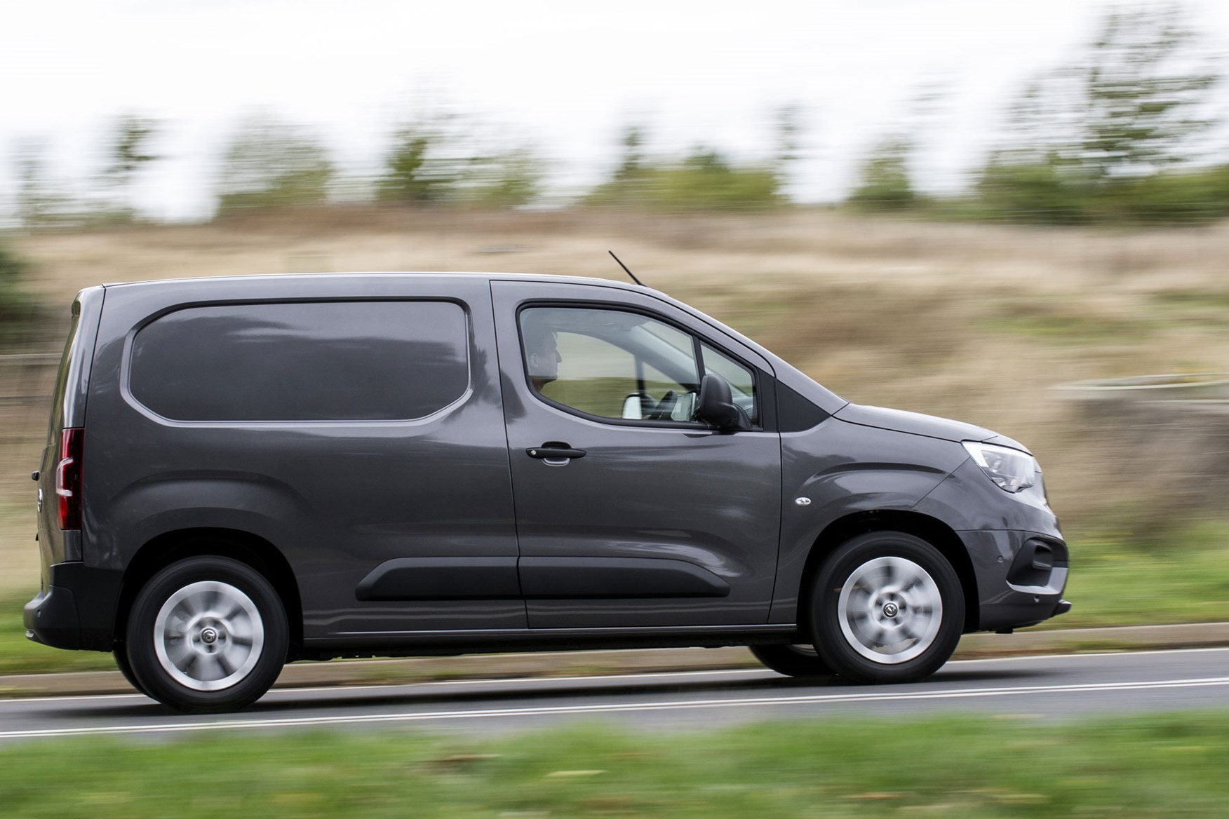 Vauxhall Combo 2019 review - grey, side view, driving