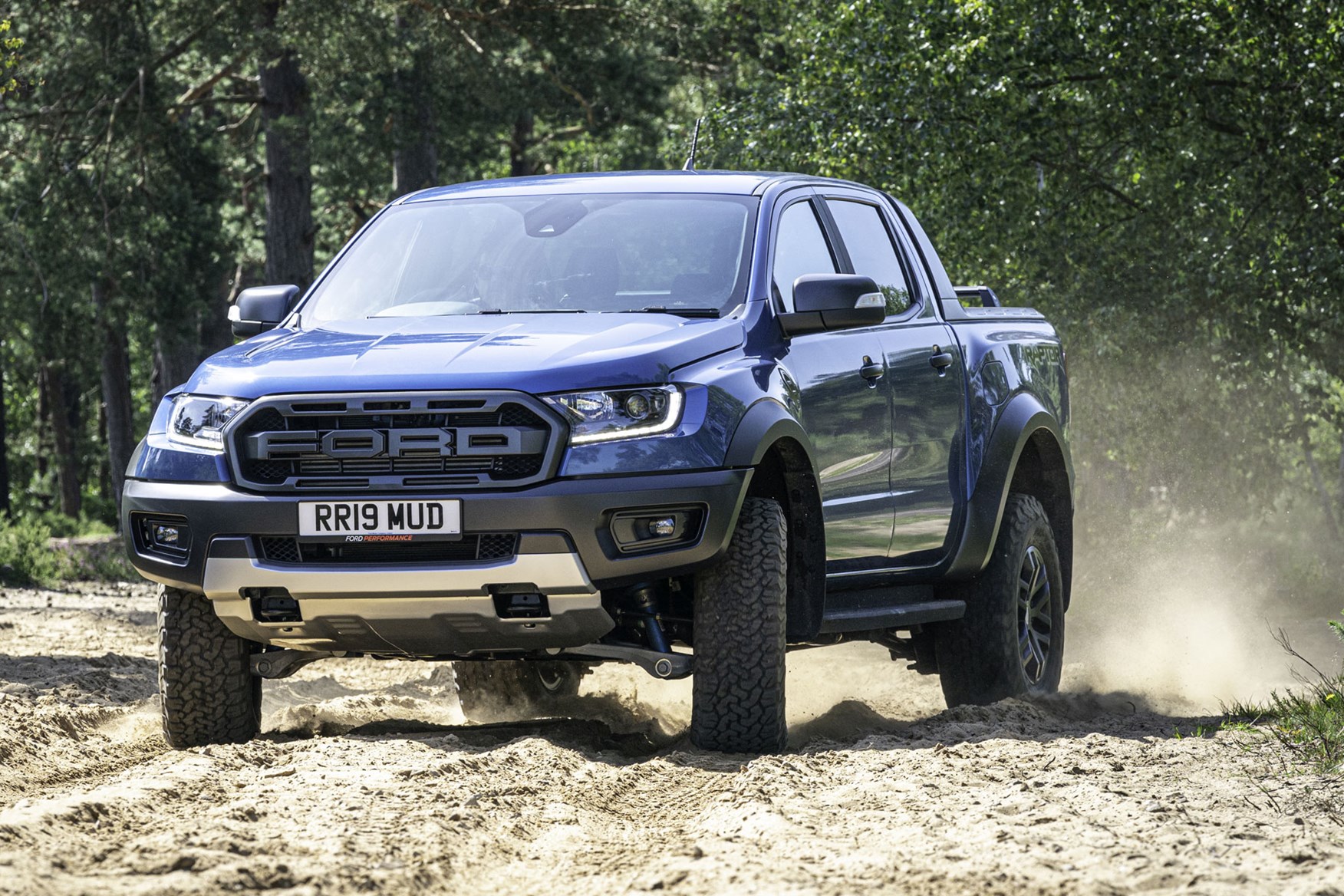 Ford Ranger Raptor review - front view, sliding sideways off road, 2019