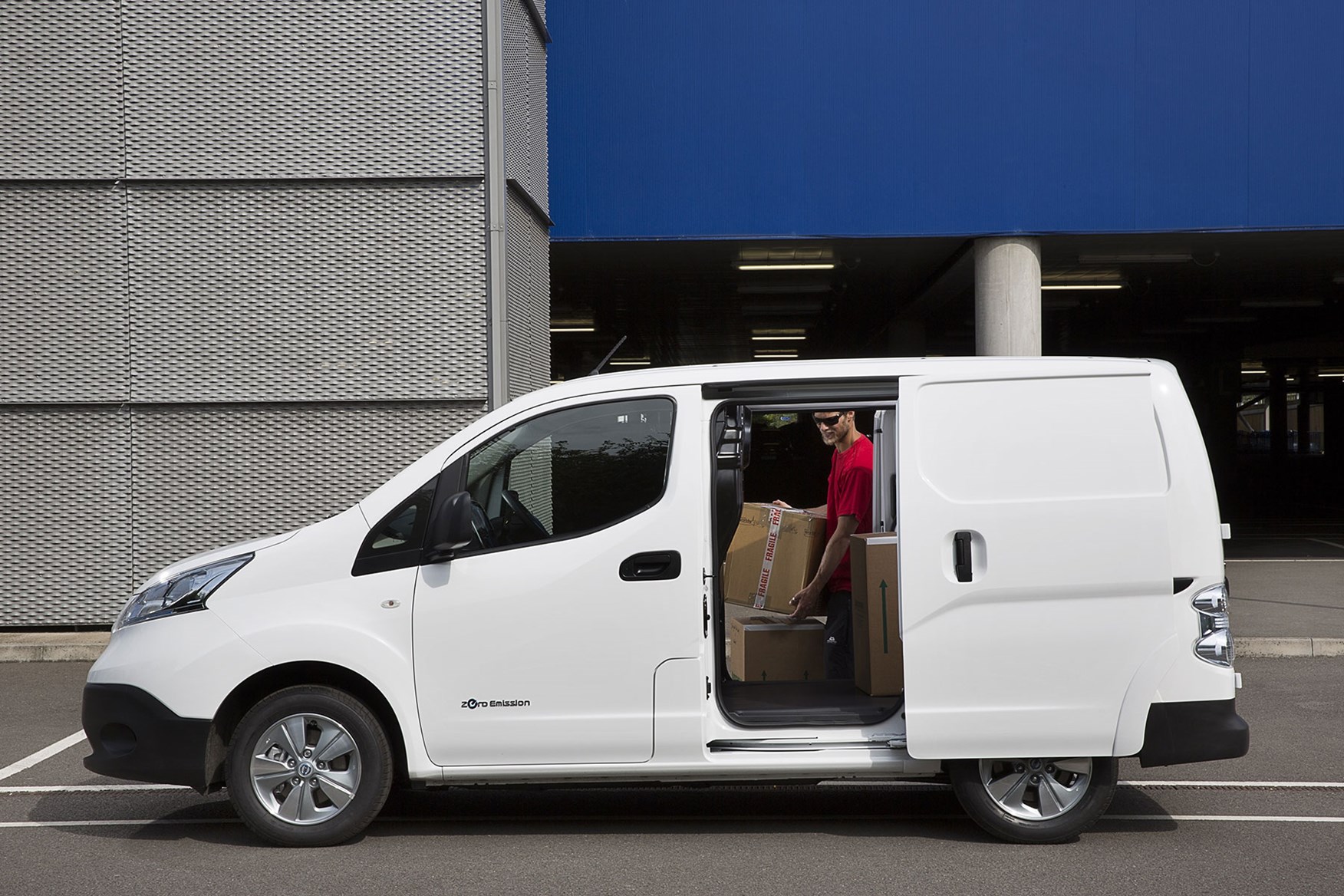 Nissan e-NV200 review, 2020, white, side view, being loaded