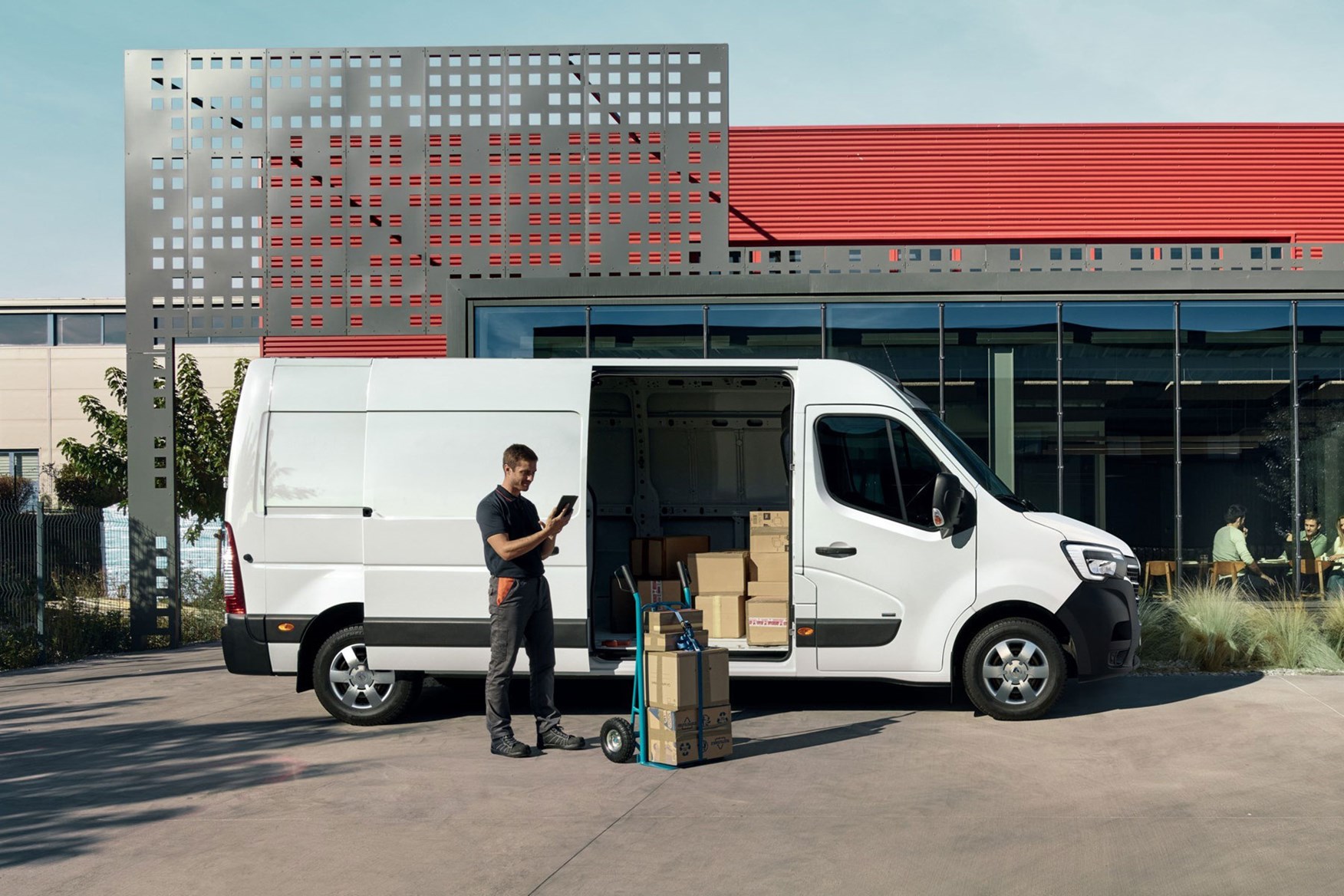 Renault Master ZE electric van review, 2020 - side view, being loaded