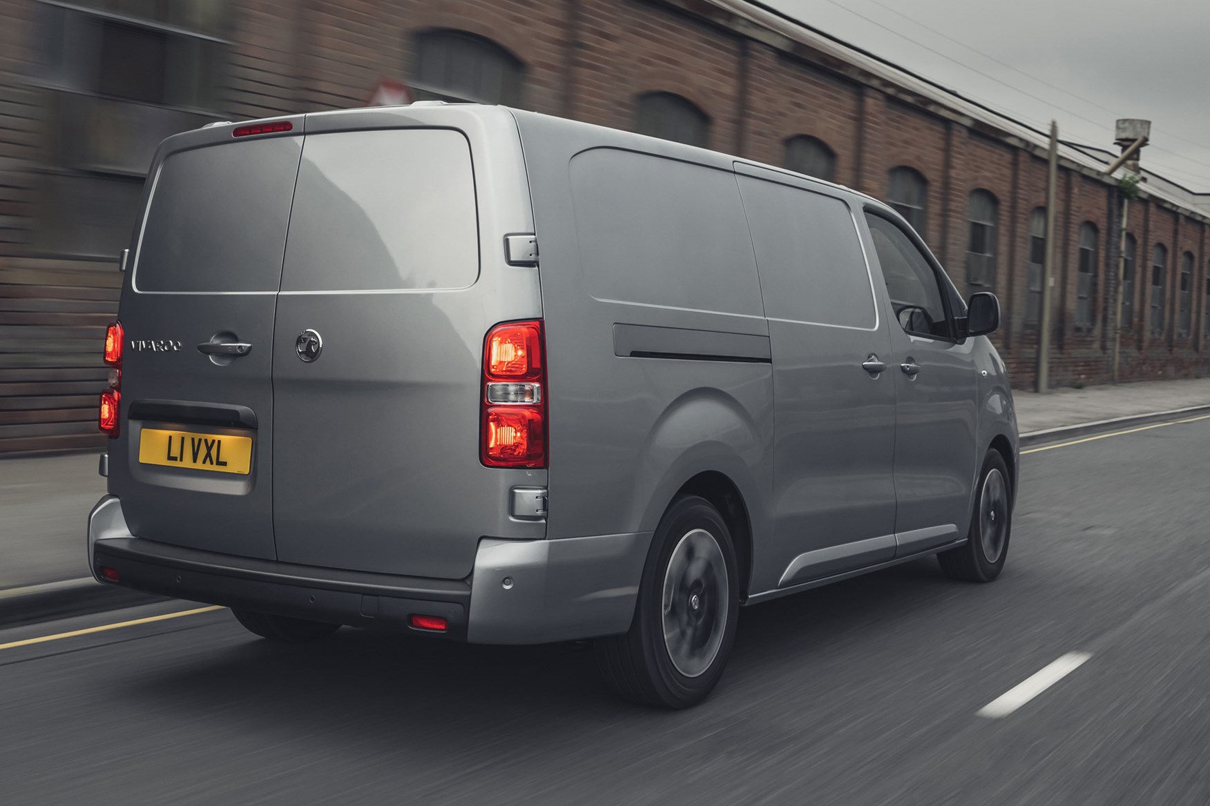 Vauxhall Vivaro-e review, 2020, electric van, rear view, driving, grey